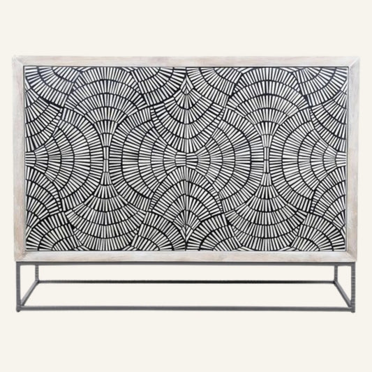Decorative console table with geometric pattern on a white background