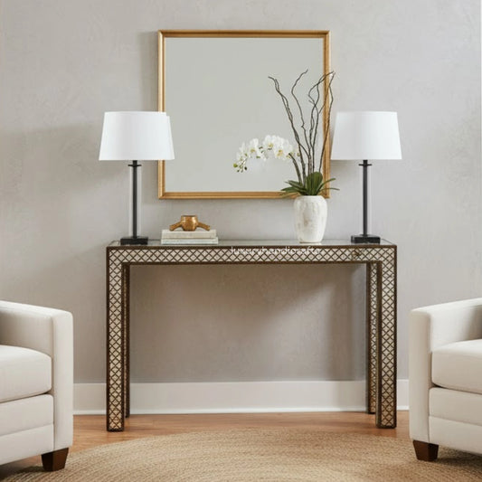 Console table with decorative items in a living room setting