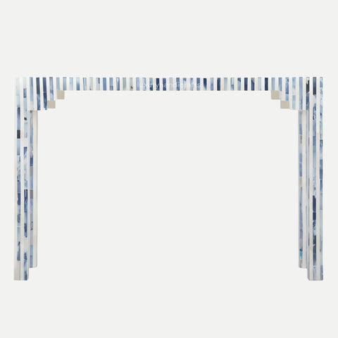 Decorative arch with blue and white striped design on a white background
