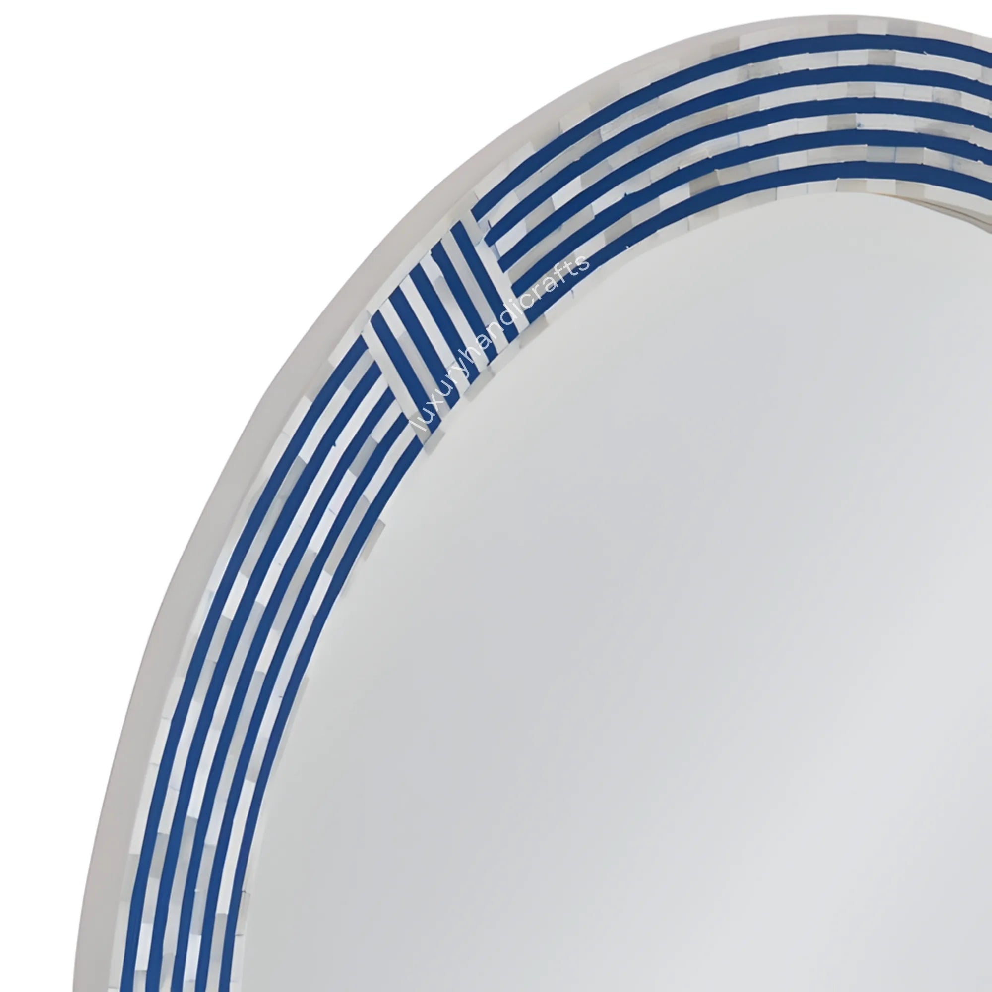 Close-up of a white plate with blue stripes on a white background