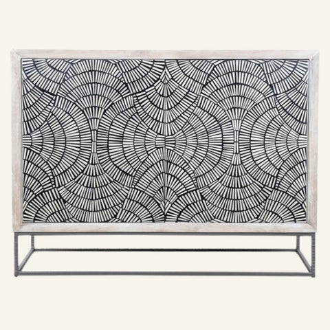 Decorative console table with geometric pattern on a white background