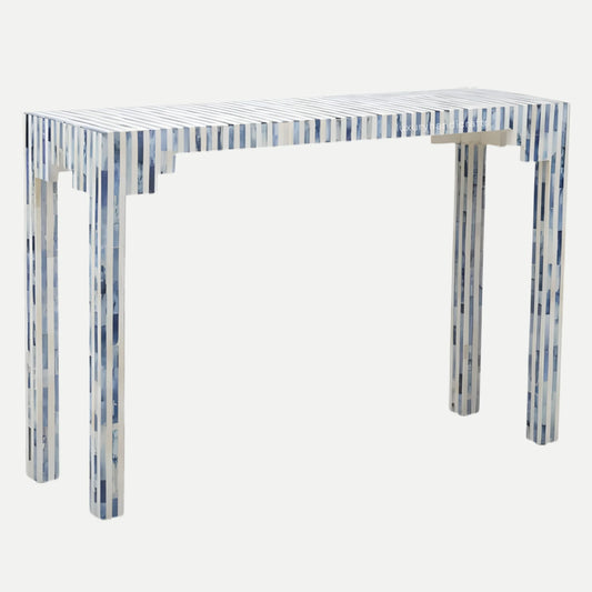 Clear console table with blue and white striped legs on a white background
