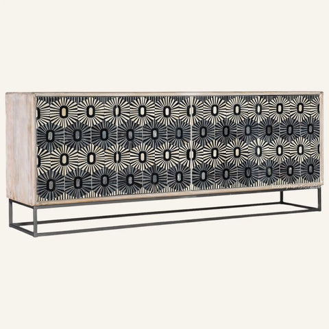 Credenza with decorative black and white pattern on a white background