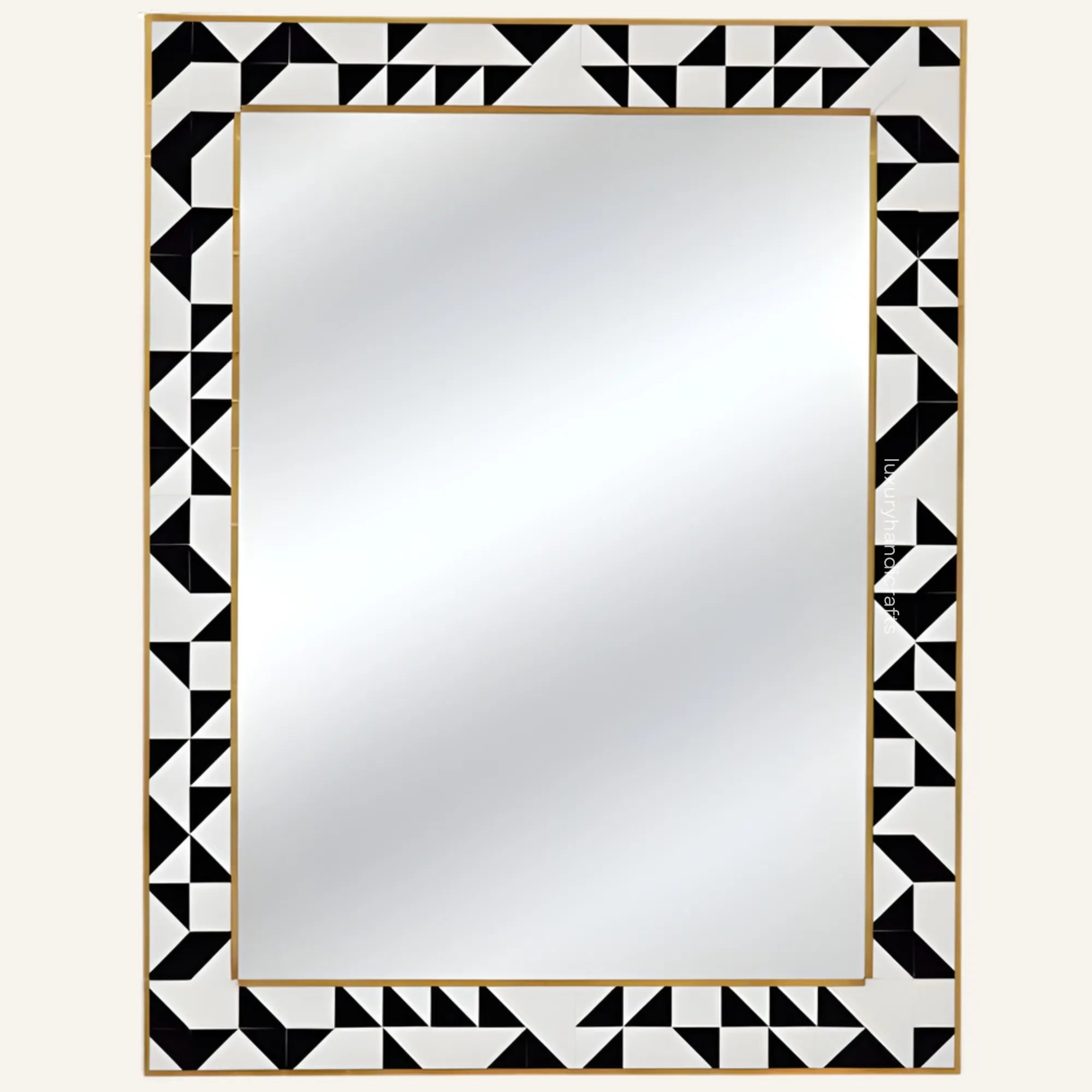 Rectangular mirror with a black and white geometric border on a white background