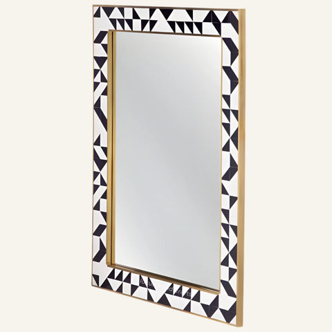 Rectangular mirror with a decorative black and white geometric frame on a white background