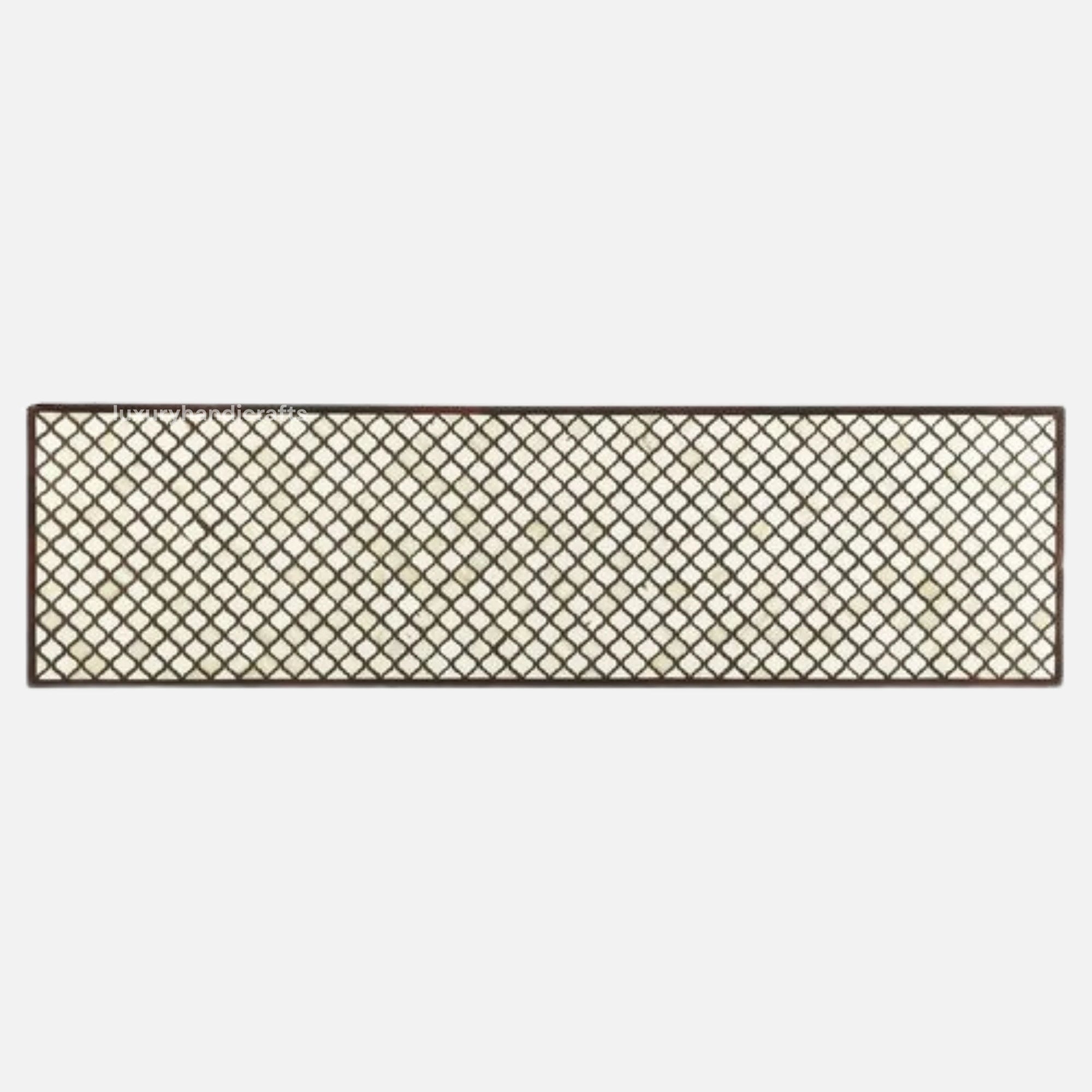 Decorative metal lattice panel on a white background