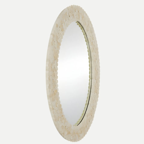 Round mirror with a textured beige frame on a white background
