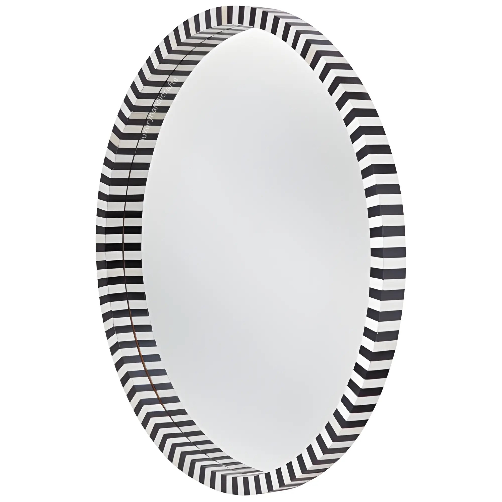 Round mirror with black and white striped border on a white background