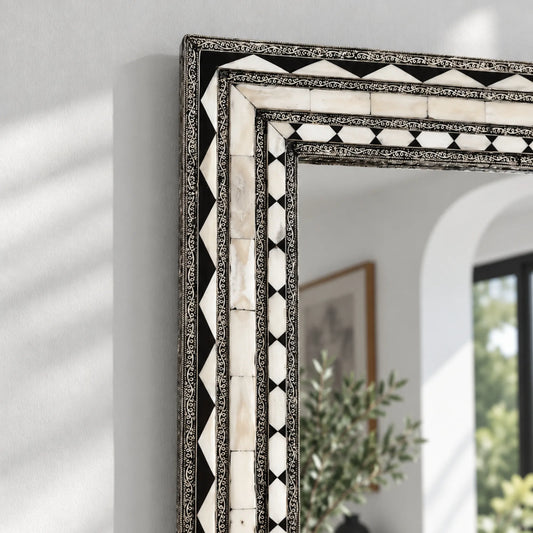 Close-up of Bone and Brass Inlay Mirror frame showing intricate geometric patterns and brass detailing