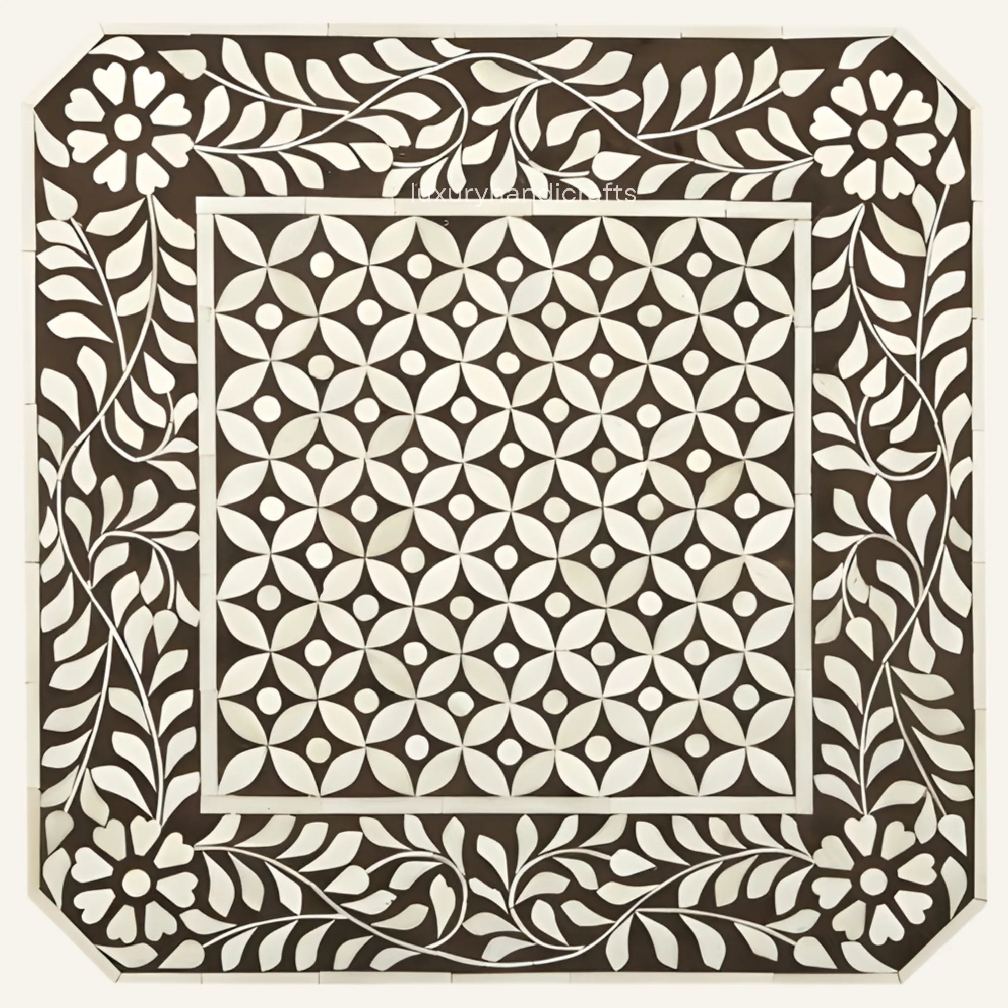Decorative tile with geometric pattern and leaf border