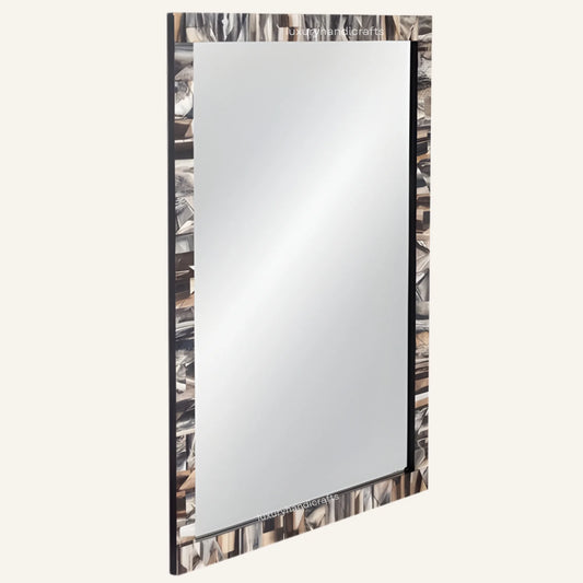 Rectangular mirror with a decorative frame on a white background