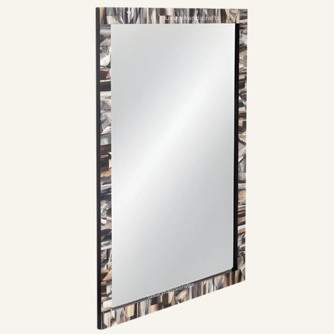 Rectangular mirror with a decorative frame on a white background