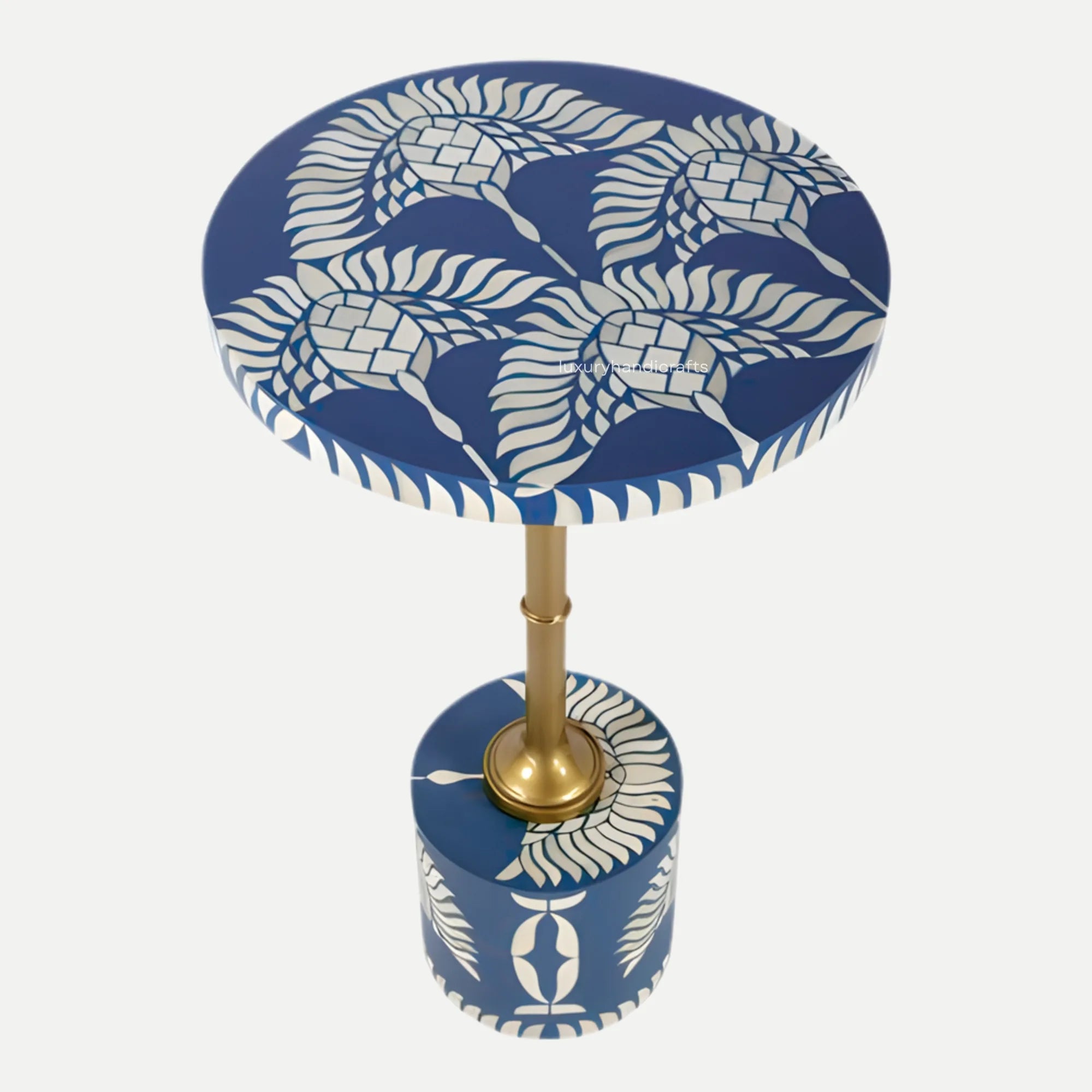 Decorative table with blue and white leaf pattern on a white background
