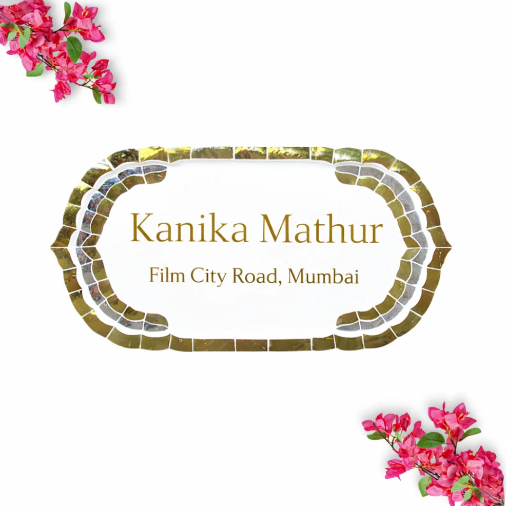 nameplate withname and address  on a white background with floral elements.