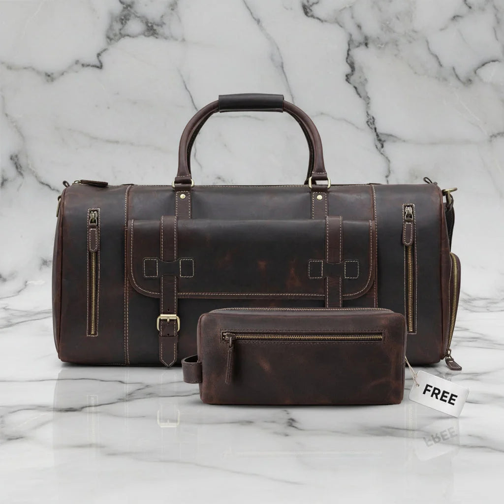 Miguel dark brown full grain leather duffle bag with top handles, zip pockets and brass hardware